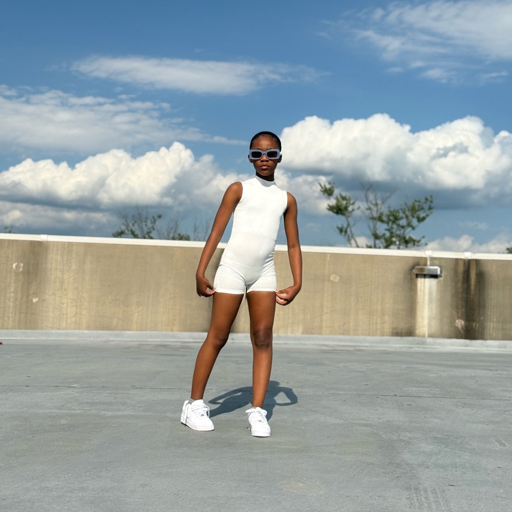 “Keep it Cute” White Sleeveless Child-ish Clothing One piece Zipper Romper.